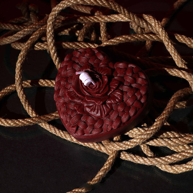 A variety of deep red low-temperature candles