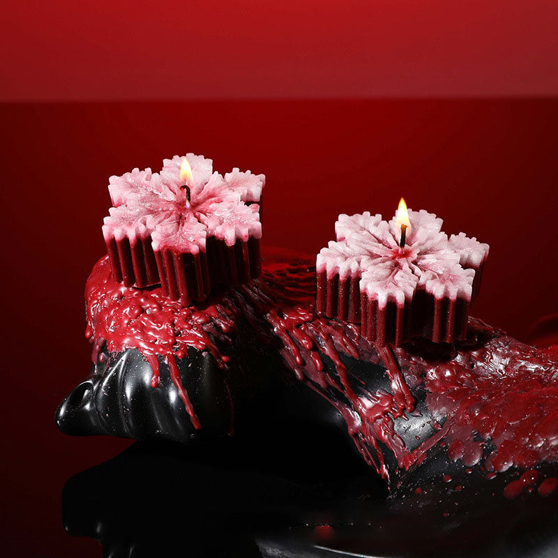 A variety of deep red low-temperature candles