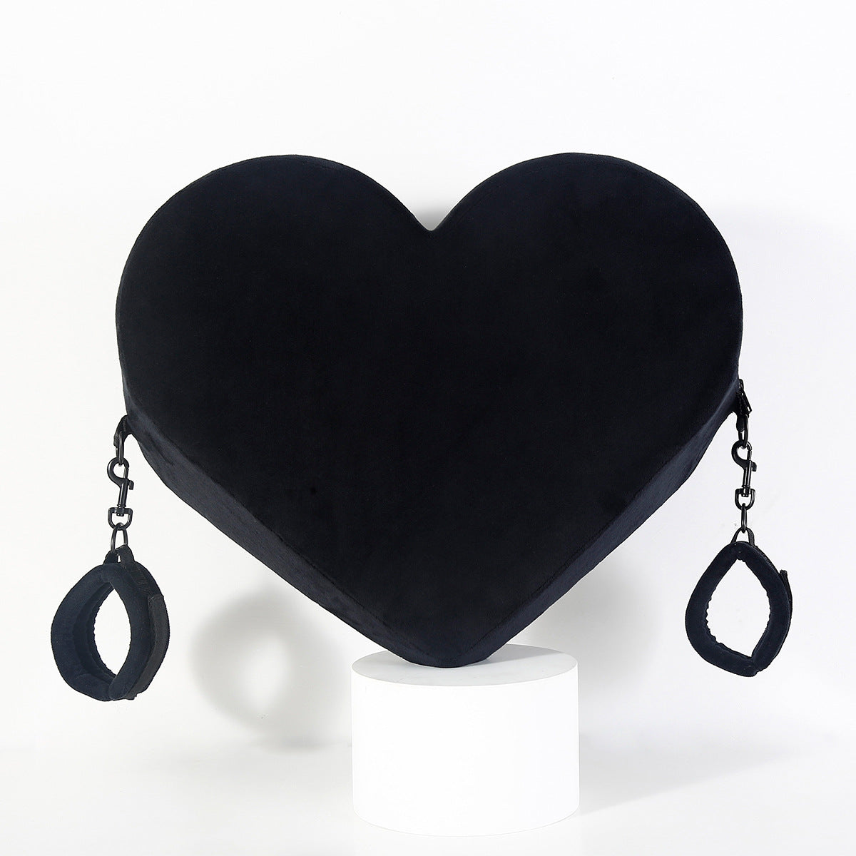 Heart-shaped pose assistance pillow with handcuffed