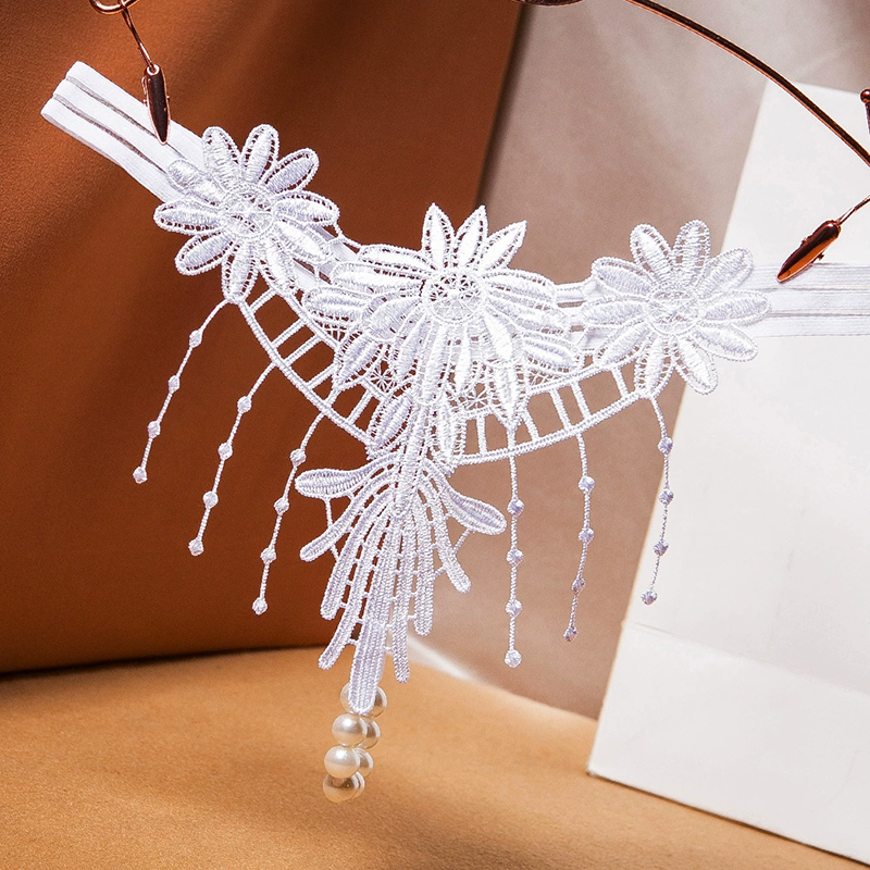 Embroidered tassel thong